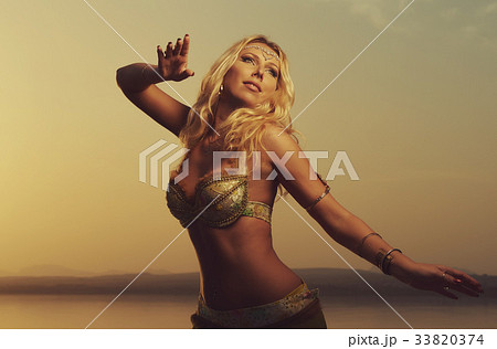 andy kisor add blonde belly dance photo